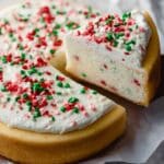 Sugar Cookie Cheesecake with Sprinkles and Sour Cream Frosting Recipe