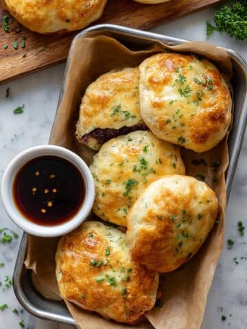 French Dip Biscuit Sandwiches with Caramelized Onions and Beef Consomme Recipe