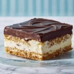 No-Bake Éclair Cake with Graham Crackers and Vanilla Pudding Recipe