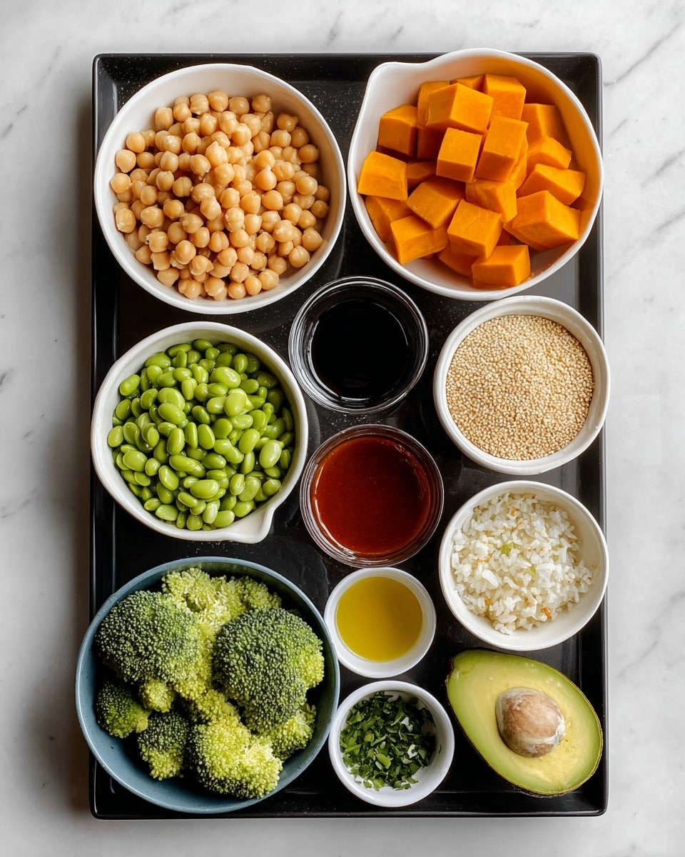 The image shows a black tray with ten bowls and one avocado half placed on a white marbled surface. Starting from the top left is a white bowl filled with round beige chickpeas. To its right is another white bowl with orange cubes of butternut squash. Below the chickpeas is a small glass bowl with dark brown liquid, next to it a small white bowl with soy sauce, and a smaller white bowl with finely chopped garlic. Beside the garlic is a small white bowl with red sauce. Below the butternut squash and sauces is a blue bowl filled with green broccoli florets. In the bottom left corner is a small white bowl of green edamame, next to it a tiny white bowl with yellow oil, then a small bowl of chopped green herbs, and beside that a white bowl filled with white quinoa. Finally, the halved avocado with a smooth green inside is placed on the bottom right corner of the tray. All bowls hold neatly arranged ingredients, and the photo is clearly lit. photo taken with an iphone --ar 4:5 --v 7