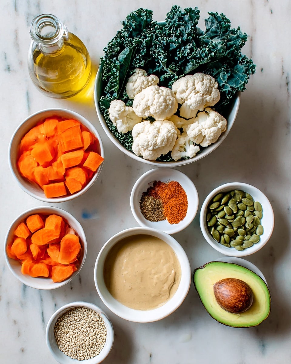 The image shows various fresh ingredients arranged on a white marbled surface. At the center bottom, a white bowl contains two sections: one filled with bright orange carrot pieces and the other with white cauliflower florets. To the left, a white bowl holds fresh, dark green curly kale leaves. Above the kale, a glass bottle with golden olive oil is visible. Next to it, there's a small white bowl filled with white quinoa seeds. Near the top center, a small white bowl contains a mix of spices, showing different colors like light brown, deep red, and orange-red powders. To the right of the spices, a white bowl holds light green pumpkin seeds. Below the pumpkin seeds, another white bowl contains a creamy, tan-colored tahini sauce. Between the spices and quinoa, a halved avocado with bright green flesh and a large brown seed is placed with one half lying flat and the other slightly tilted. The overall setup is neat and the colors are natural and vibrant. Photo taken with an iphone --ar 4:5 --v 7