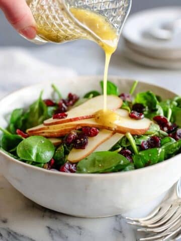 Pear and Arugula Salad with Dates Cranberries and Toasted Almonds Recipe