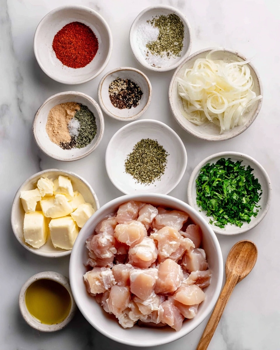 The image shows a white bowl filled with raw, diced chicken pieces at the bottom center. Around it are smaller white bowls arranged in a loose circle on a white marbled surface. The smaller bowls hold different ingredients: coarse salt with a small wooden spoon, black pepper, minced garlic, smoked paprika, dried Italian seasoning, chopped fresh parsley, onion powder, butter cut into small cubes, and olive oil with a smooth texture. Each bowl clearly shows the texture and color of the ingredient inside, with the butter being creamy pale yellow, the parsley bright green, and the paprika a deep red. Photo taken with an iphone --ar 4:5 --v 7