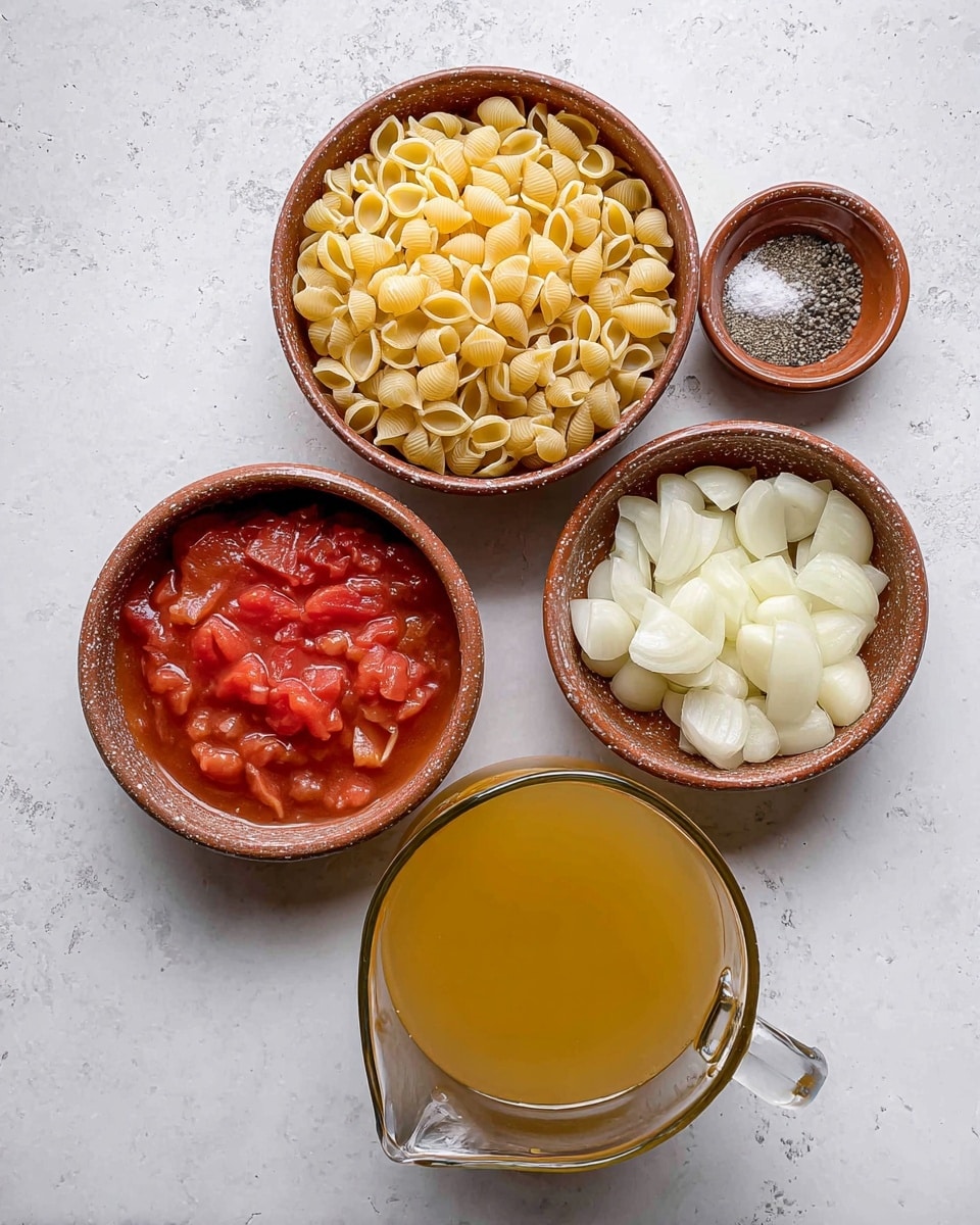 The image shows five bowls and a glass jug of cooking ingredients arranged on a white marbled surface. At the top center, a round clay bowl is filled with light yellow small shell pasta. To the right of this, a smaller clay bowl contains white salt and black pepper. Below the pasta bowl, on the right side, a clay bowl holds several pieces of white onion segments. To the left of the onion bowl, another round clay bowl contains red tomato chunks in a thick sauce. At the bottom center, a glass jug is filled with golden yellow chicken broth. All containers are placed close together, creating a neat arrangement. Photo taken with an iphone --ar 4:5 --v 7