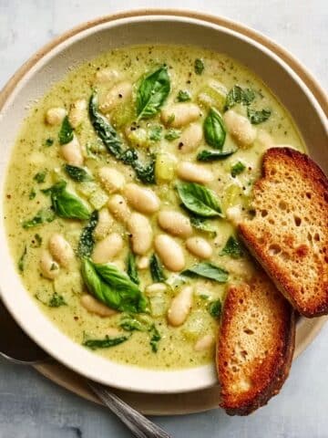 Creamy Pesto Beans with Crusty Baguette Recipe