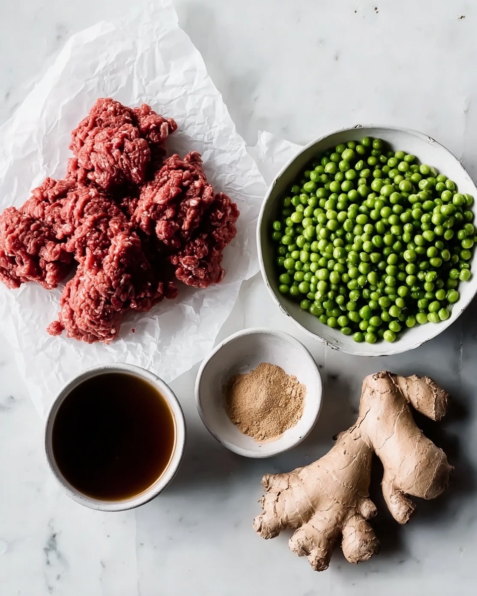 The image shows five main ingredients placed on a white marbled surface. In the top left, there is a pile of raw red ground meat resting on white parchment paper, with a rough and textured appearance. To the right, there is a white bowl filled with small round green peas, showing a smooth and slightly shiny texture. Above the peas, a small white bowl holds a light brown powdery spice. Below the peas, fresh ginger root lays on the surface, its skin wrinkled and knobby with a tan color. In the bottom left, a white cup contains a dark brown liquid, smooth and reflective. photo taken with an iphone --ar 4:5 --v 7