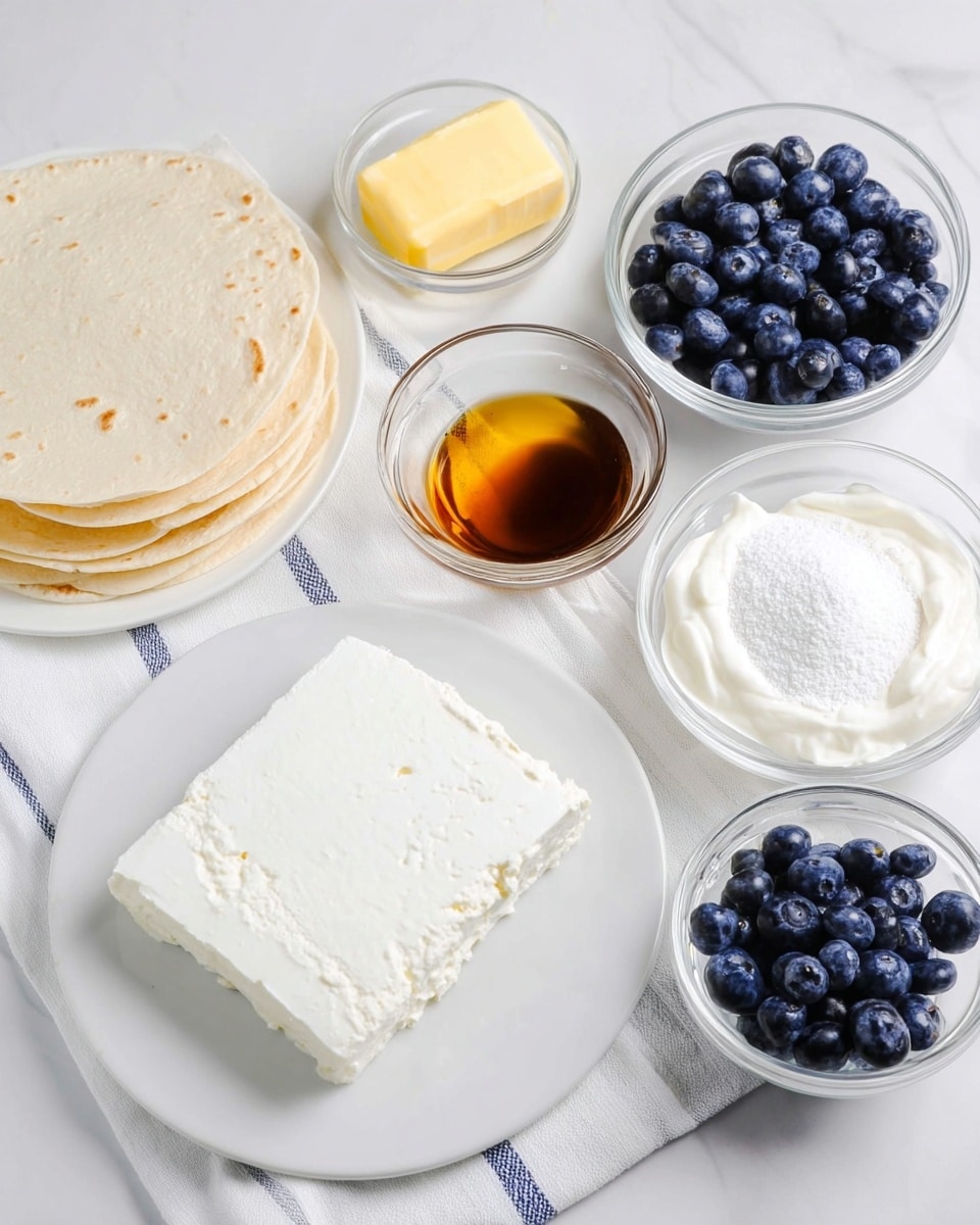 A white rectangular dish holds a large block of soft white cream cheese. Next to it on a white round plate are several small, light beige, round tortillas stacked neatly. Surrounding these larger plates are small clear glass bowls arranged on a white marbled surface: one with a yellow butter cube, another with thick white yogurt, a third with dark amber vanilla extract, a fourth filled with powdery white sugar, and a final bowl containing fresh round blueberries that are deep blue with a smooth texture. The items are spaced evenly on a white striped cloth under some of the dishes. photo taken with an iphone --ar 4:5 --v 7