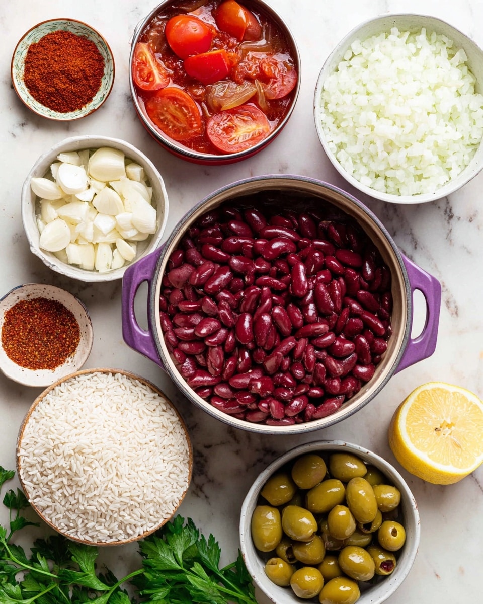 The image shows several small bowls and containers with different ingredients arranged on a white marbled surface. At the center, a purple pot holds a large amount of cooked dark red kidney beans, with a few beans showing split skins. To the left and bottom of the pot, a medium white bowl is full of uncooked white rice grains. Above the rice, there is a small white bowl with finely chopped garlic cloves. Next to the garlic, an open can reveals whole peeled tomatoes in a thick red sauce. To the right of the pot of beans, there is a white bowl filled with finely diced white onions. Above the onions is a small bowl holding green olives with pimentos. A half lemon slice sits to the right side of the onions. At the top left corner, a small bowl contains an assortment of ground red spices arranged in small piles of different shades of red and brown. Fresh green parsley leaves lie scattered near the rice bowl. The colors are vibrant and textures are clear, all placed on a white marbled surface, photo taken with an iphone --ar 4:5 --v 7