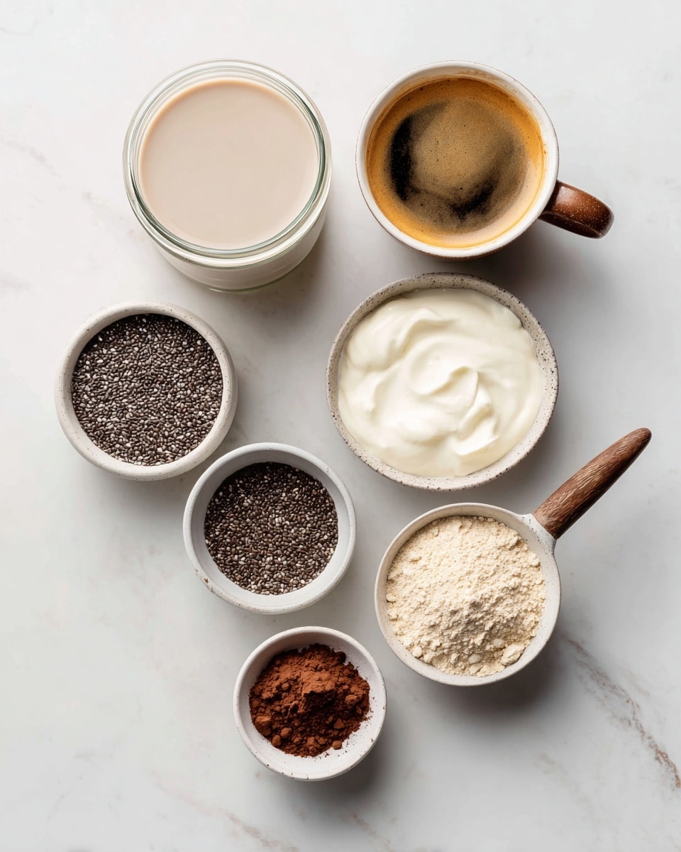 The image shows six white bowls and a glass jug arranged on a white marbled surface. The top left glass jug is filled with smooth, creamy almond milk, clear enough to show its light beige color. To the right, a small white bowl contains a dark brown espresso with a rich crema on top, the bowl featuring a wooden handle. Below the jug, a white bowl holds thick, creamy white yogurt with a smooth surface. Next to it, a medium white bowl is filled with tiny round black chia seeds with a slightly rough texture. On the bottom right, a white bowl contains light beige protein powder with a powdery, fine texture. Lastly, at the bottom center, a small white bowl holds dark brown, finely powdered cocoa. The overall arrangement is neat, each bowl showing different textures and neutral to dark colors, all displayed against the bright white marbled background. photo taken with an iphone --ar 4:5 --v 7