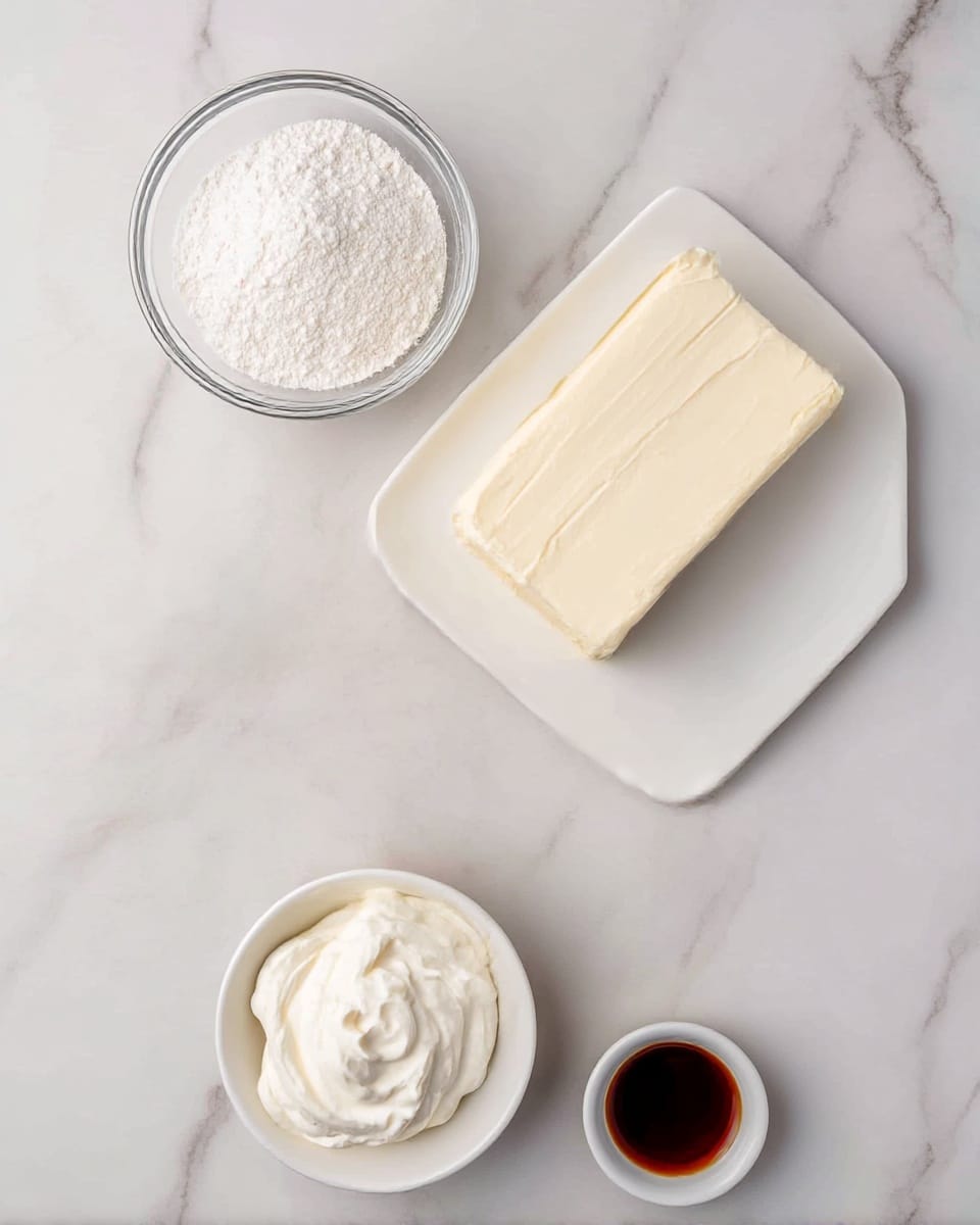 The image shows four separate containers with different ingredients placed on a white marbled surface. At the top left, there is a clear glass bowl filled with a white powdered substance. On the right side, a rectangular block of cream cheese sits on a white plate, showing a smooth and creamy texture. Below the bowl, there is a small white bowl filled with thick white sour cream. At the bottom right, a tiny white bowl contains dark brown vanilla extract. photo taken with an iphone --ar 4:5 --v 7