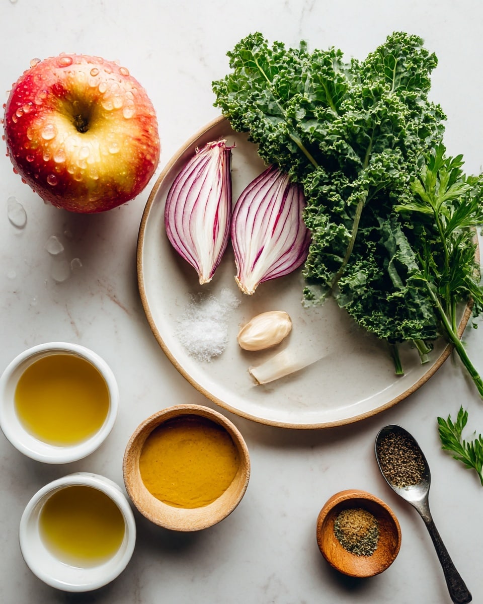 The image shows several fresh ingredients on a white marbled surface. Near the bottom left is a red and yellow apple with water droplets on it. Above the apple, there is a cluster of curly, green kale leaves with tiny water drops. In the center, a round white plate holds two long, thin shallot halves with purple streaks, a peeled garlic clove, two small spoons – one with coarse salt and the other with ground black pepper, and a small wooden bowl filled with smooth yellow mustard. To the left of the plate, two small white bowls contain pale yellow oil and an amber-colored liquid. Some parsley sprigs are on the top right of the image. photo taken with an iphone --ar 4:5 --v 7