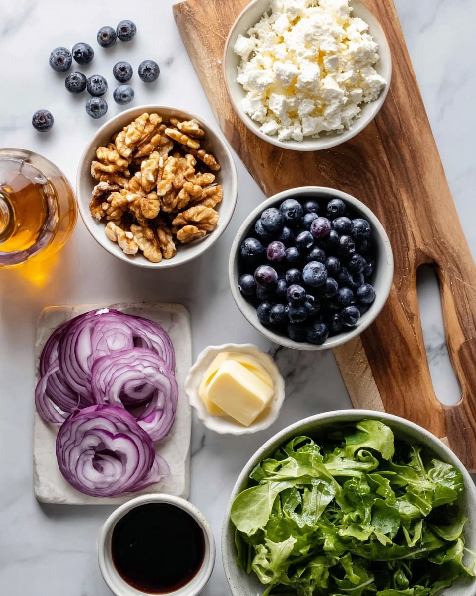 The image shows a white marbled surface with several small white bowls and a cutting board arranged neatly. One bowl contains golden brown walnuts, another has white crumbled cheese, and a third bowl is filled with fresh, dark blue blueberries. On the white marbled surface, more blueberries are scattered around. Next to the bowls, thinly sliced rings of purple onion rest on a wooden cutting board. A small white bowl holds a pale yellow dollop of butter or spread. Below the bowls, there is a bottle of amber-colored vinegar or dressing and a small white bowl filled with dark balsamic vinegar. In the lower part of the image, a white bowl contains fresh green leafy salad. A woman's hand is not visible here. Photo taken with an iphone --ar 4:5 --v 7