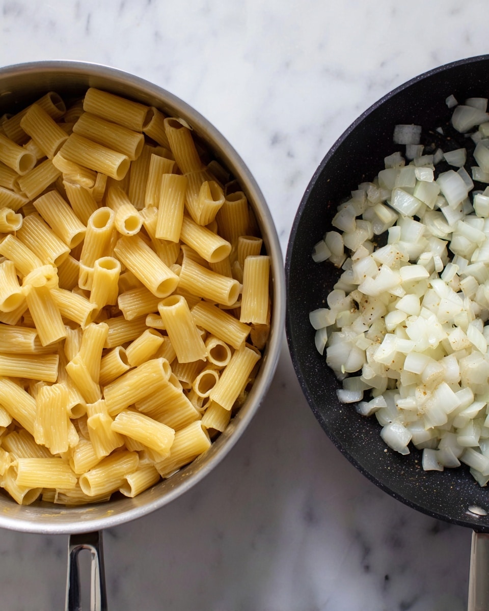 In the first image, there is a pot filled with cooked rigatoni pasta. The rigatoni pieces are short, tube-shaped, with ridges, and light yellow in color, filling the pot almost to the top. In the second image, a white marbled surface is under a black pan where chopped onions are cooking; the onions are white and translucent with some light brown spots from cooking, scattered evenly across the pan. Both images have simple kitchen tools with the pot and pan handles visible, and the background is a white marbled surface. photo taken with an iphone --ar 4:5 --v 7
